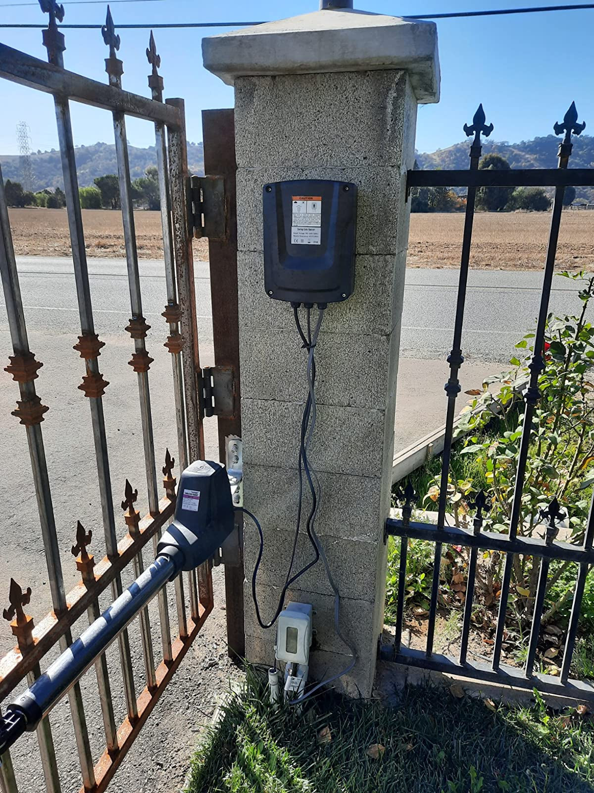 AT1202 Heavy Duty Dual Swing Gate Opener in real life