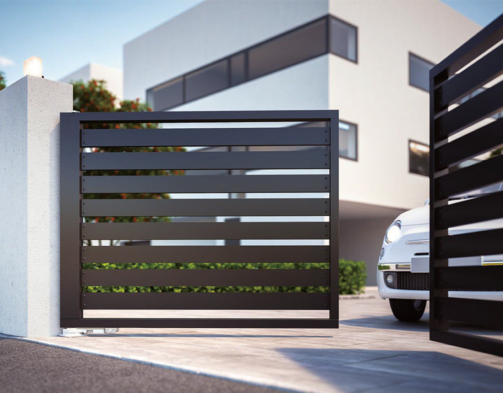Features car drives through the swing gate